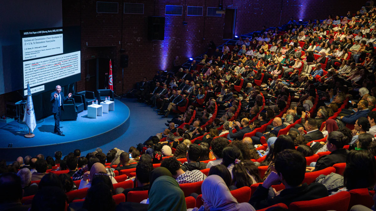 Speaker presenting confidently to a large audience in a dramatic auditorium