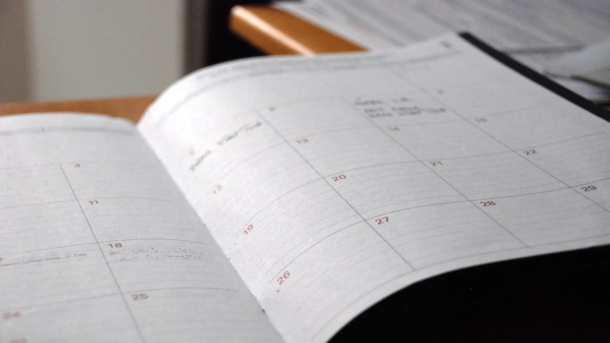 Open monthly planner on a wooden desk for organising priorities