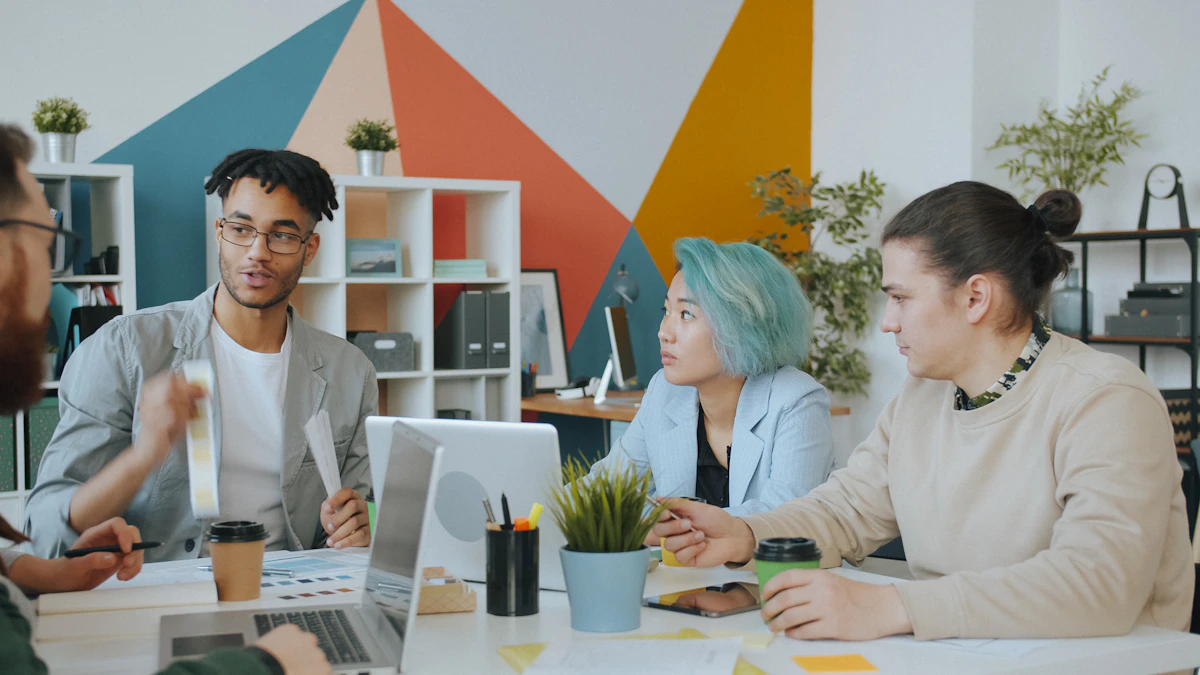 Diverse group of colleagues collaborating together in a colourful office